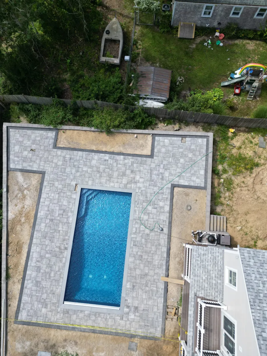 Aerial view of a new pool and patio layout