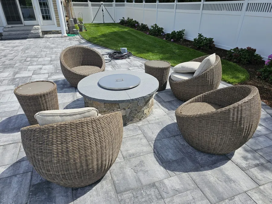 Fire pit seating next to a pool